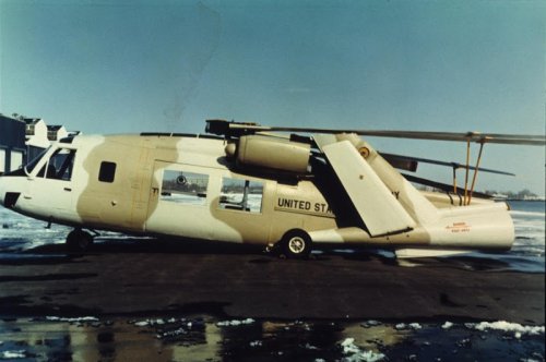 Boeing-Vertol YUH-61A with folded blades and tail ready for transport in a C-130 Hercules.jpg