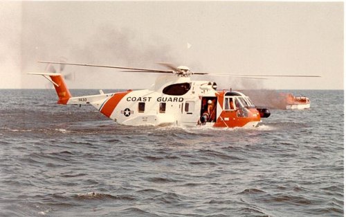 640px-HH-3F_Pelican_on_the_water_with_a_burning_boat.jpg