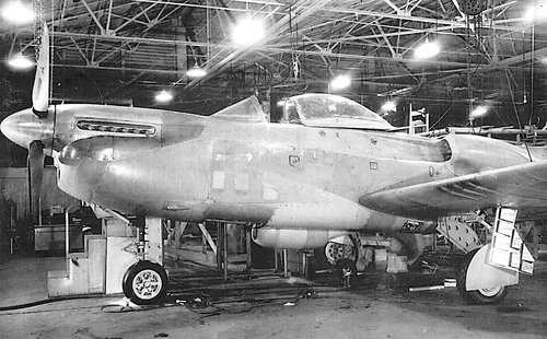 The first XP-81 prototype’s Packard engine installation being finalized at the Vultee plant.jpg