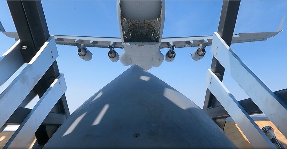 020Rapid DragonJASSM-ER C-17 and C-130SJ on a pallet.jpg