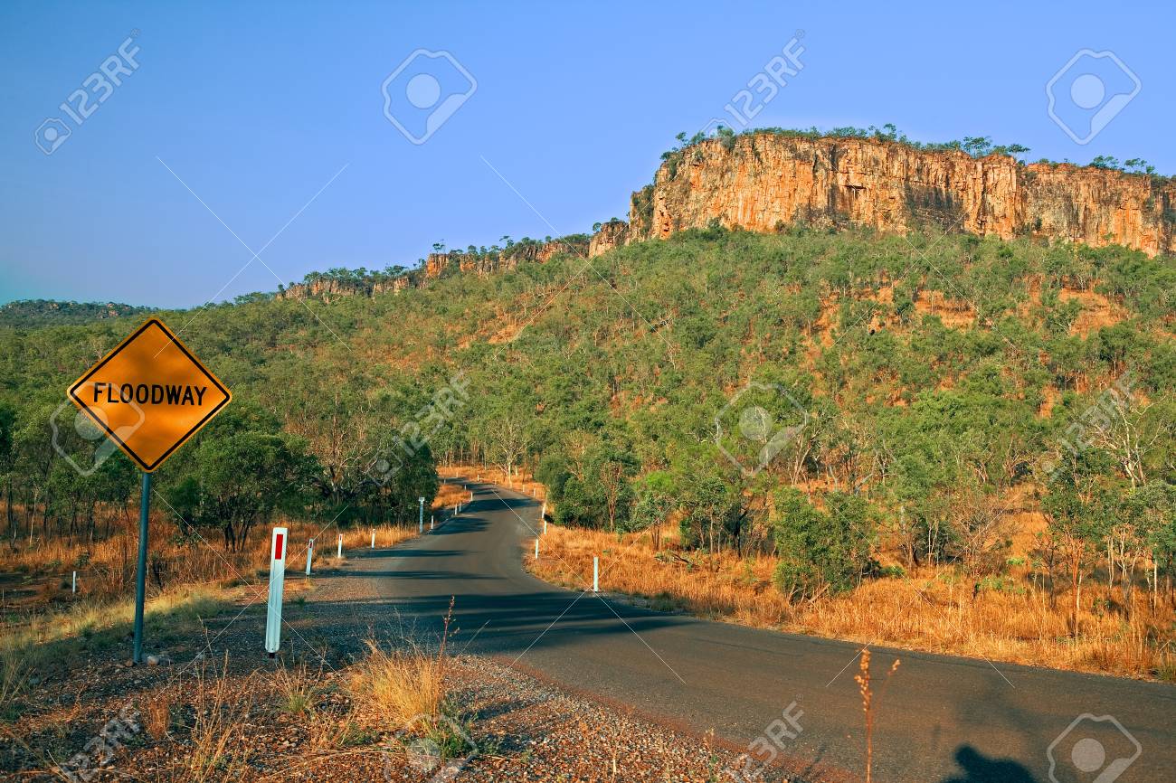 14852068-floodway-warning-road-sign-at-Australian-outback-Northern-territory-the-bush-with-dry-vegetation-jus-Stock-Photo.jpg