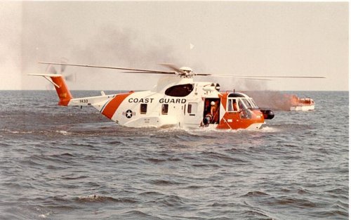 640px-HH-3F_Pelican_on_the_water_with_a_burning_boat.jpg