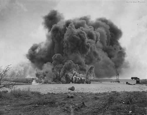 Burning_B-29_73rd_BW_following_Japanese_attack_on_Isley_Field_44.jpg