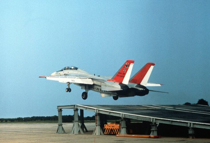 a-left-side-view-of-an-f-14a-tomcat-aircraft-taking-off-from-a-ramp-raised-3d6bb1.jpg