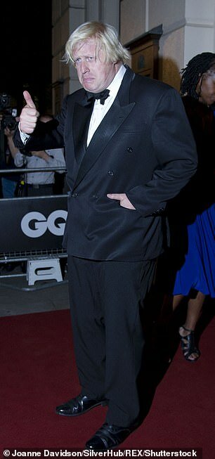 14712368-7134727-Pictured_Boris_Johnson_at_GQ_Men_of_the_Year_2013-m-55_1560372251322.jpg