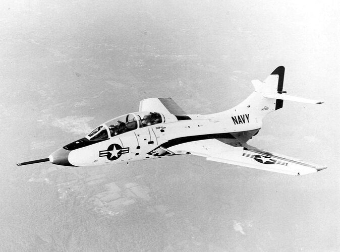 1024px-F9F-8T_Cougar_in_flight_c1956.jpg