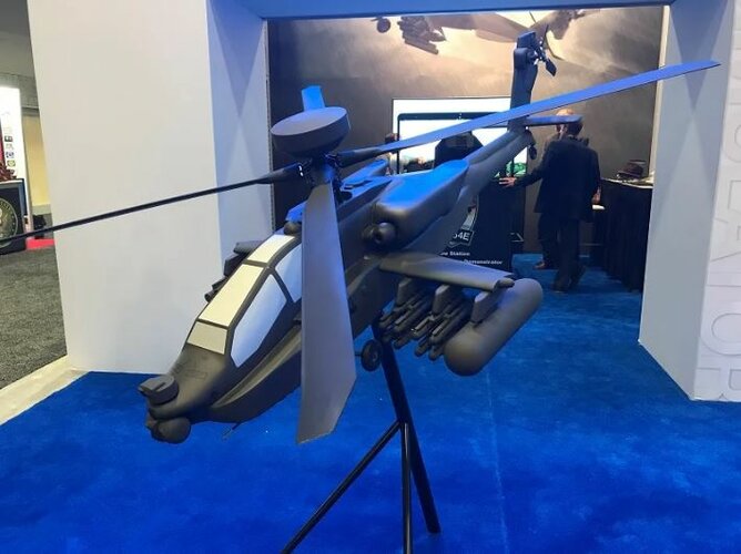 A scale mock up of the Apache V6.5 showcased at AUSA 2022.JPG