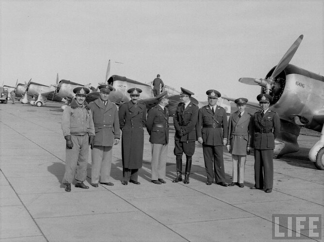 USSAC officers of teh Air Training Mission with Argentine CAe officer, REgimiento Aérep Escuel...jpg