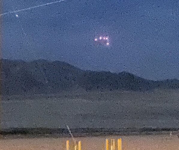 50 marines witness and film triangle UFO over base.jpg