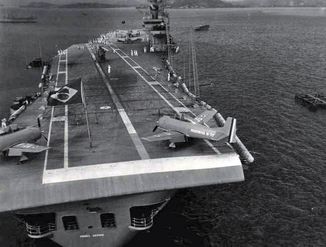 Brazilian T-28 on Minas Gerais in Guanabara Bay.jpg