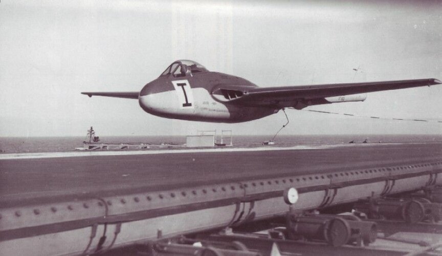 Royal Navy Sea Vampire F.21 (VT803) of 764 Sqn during test on HMS Warrior (early 1949).jpg