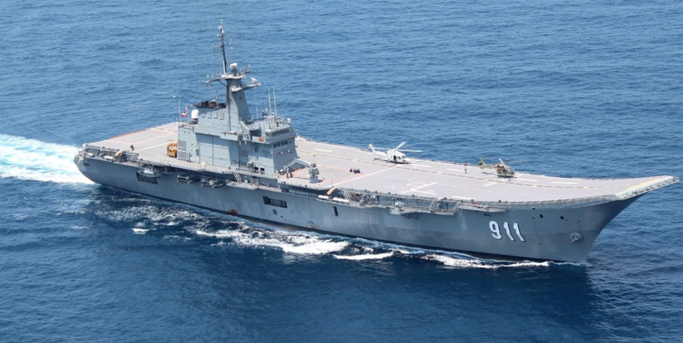 Thai Navy HTMS Chakri Naruebet (CVH911) at sea with Seahwak on deck.png