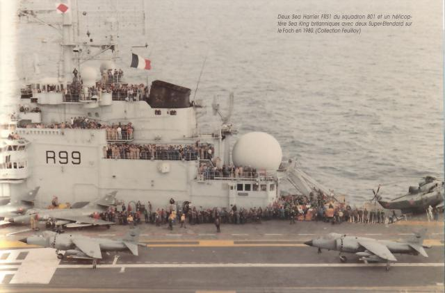 Royal Navy Sea Harrier FRS.1 du 801 Sqn et Sea King à bord du Foch (R99) (1980).png