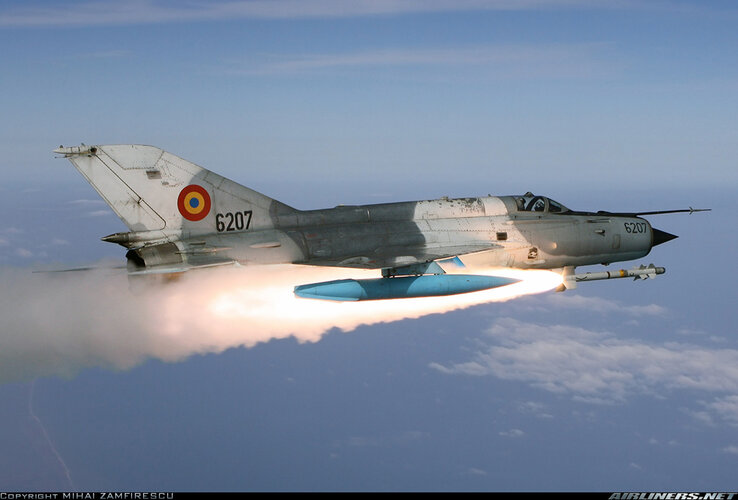 Romanian MiG-21MF-75 LancerC (6207, 96006207) firing Magic 2 over his land (8 September 2009).jpg