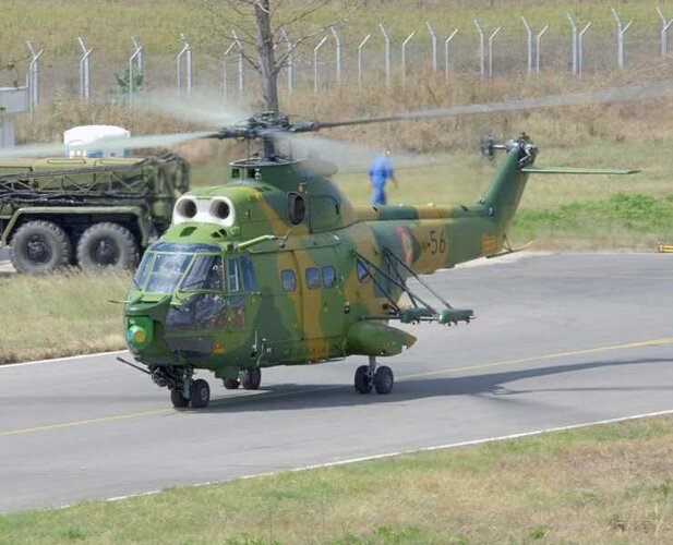 Romania IAR-330L Puma 20mm gun turret + outriggers for AT-3 Sagger ATGM.jpg