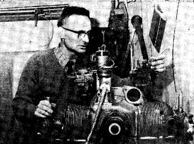 Hans van den berg working on the engine.PNG