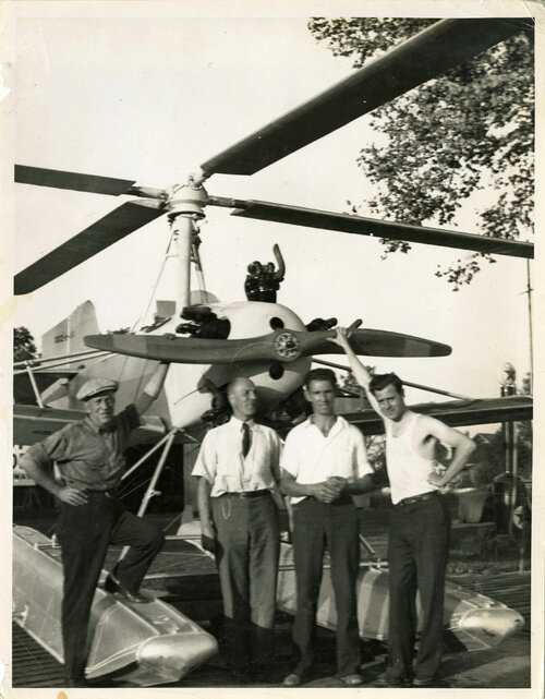 XOZ-1 Seaplane with group of men (1936).jpg