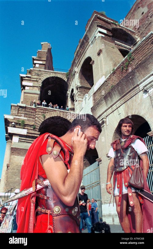 roman-centurion-on-mobile-phone-near-the-colosseum-A7MC6B.jpg