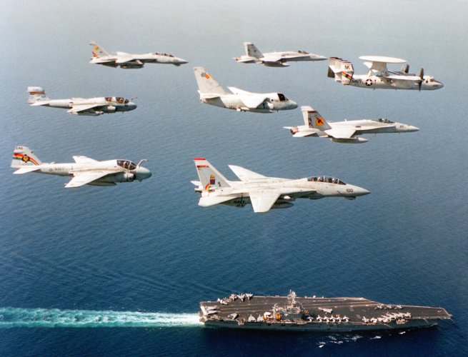 Aircraft_of_US_Navy_Carrier_Air_Wing_14_in_flight_over_USS_Carl_Vinson_(CVN-70)_on_1_May_1994_...jpg