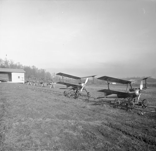 Two Kettering Bugs on a rail track ready for launch at the Dayton-Wright Airplane Company.jpg