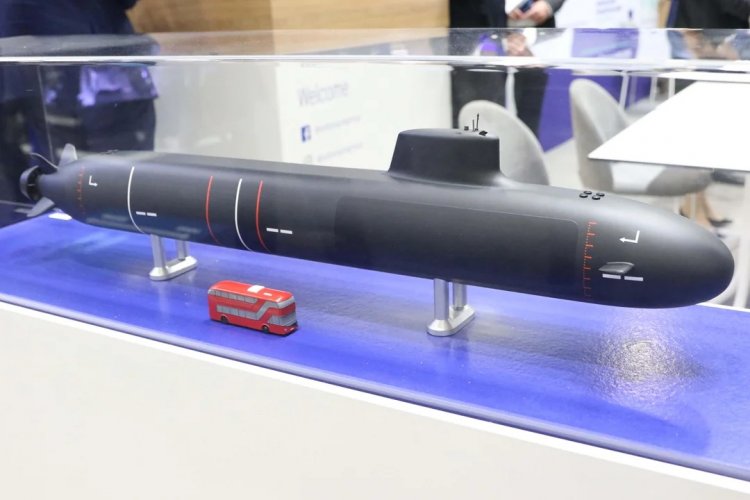 model-of-the-ssn-aukus-displayed-by-rolls-royce-with-bus-for-scale.jpg