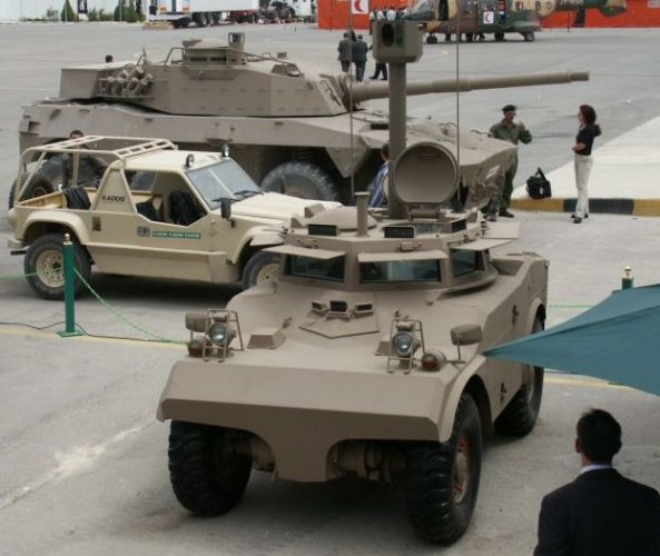 Eland with CS-75 scout vehicle.jpg