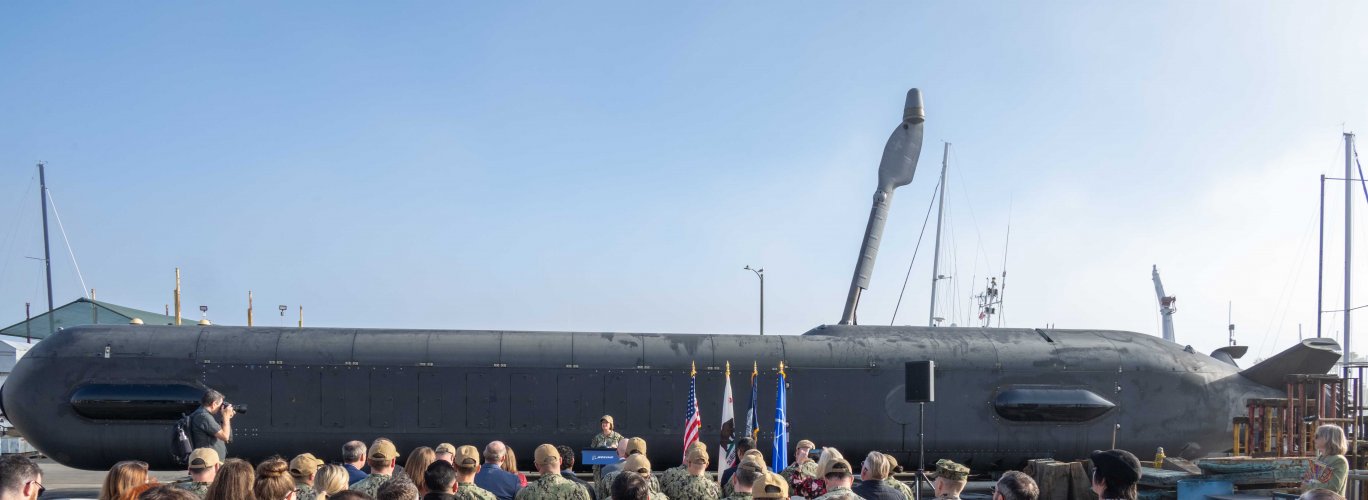 CNO_Adm._Lisa_Franchetti_speaks_in_front_of_Boeing’s_Orca_Extra_Large_Unmanned_Undersea_Vehicl...jpg