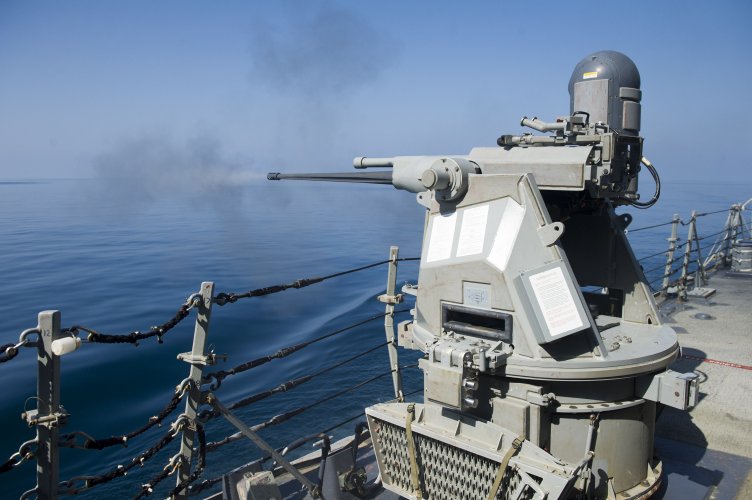 Firing_a_Mk_38_25mm_autocannon_by_remote_control_-160301-N-VE959-131_(25434908752).jpg