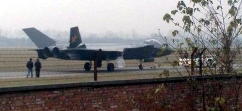 J-20 towed down runway.jpg